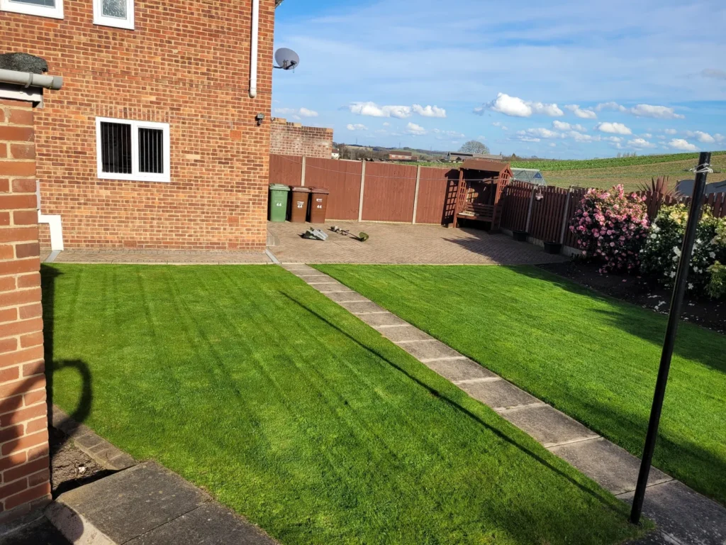 Healthy maintained lawn with regular mowing and lawn treatments in Wakefield